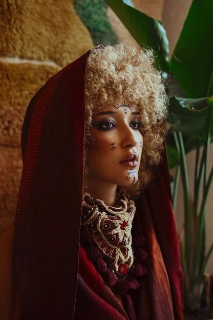 Fashion editorial portrait: High Fashion model with Editorial makeup, hair and styling by K.Aura Agency.